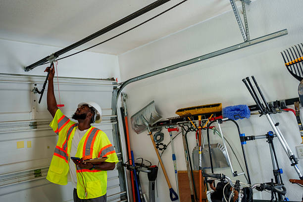 Professional Garage Door Maintenance technician working in Bull Mountain, OR